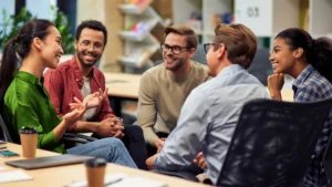 Stock image of people sitting in a boardroom discussing a topic